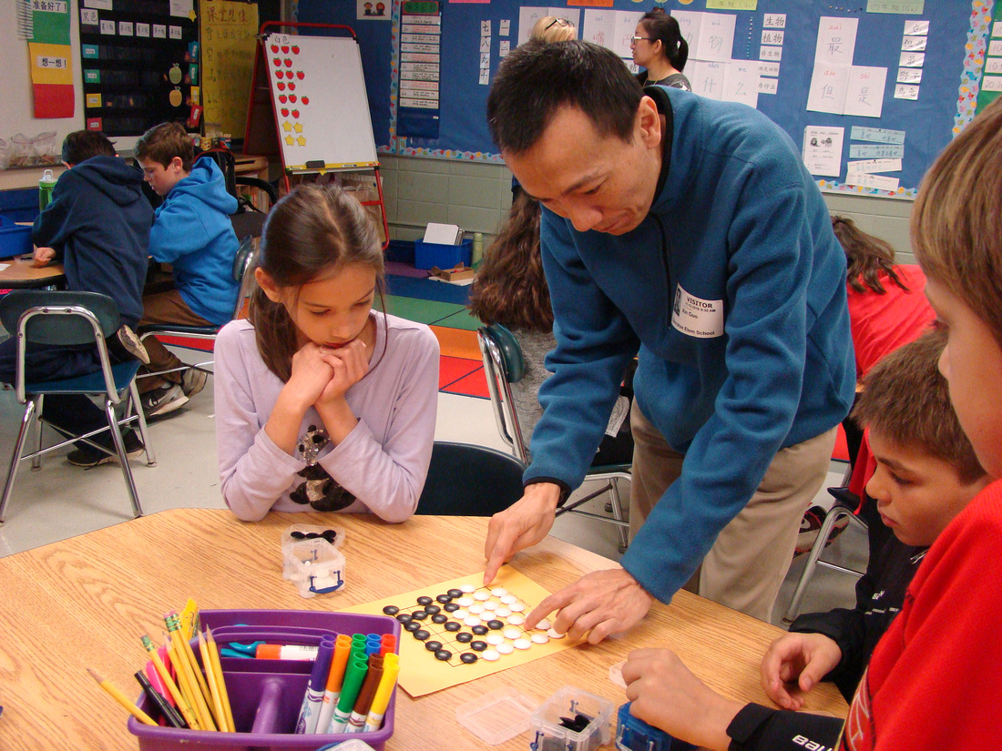 Promoting go in schools (source: Xinming Simon Guo)